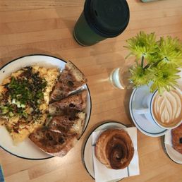 Chili eggs with miso toast and a cinnamon roll Chili eggs with miso toast and a cinnamon roll