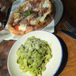 Pizza and fresh pasta with pesto