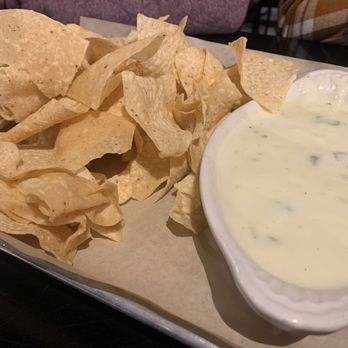 The Rock Yard Kitchen & Bar - Queso and chips - Pizza Near Me - Trenton, Texas
