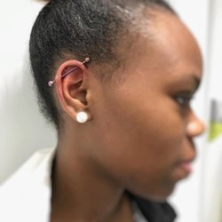 Almost Famous Body Piercing - Pierced ear with jewelry. Almost Famous Body Piercing in Mankato, Minnesota.