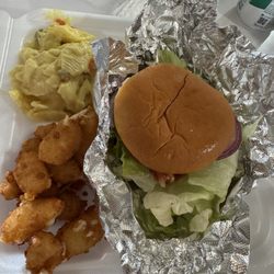 Dille's - Fully dressed brisket burger with cheese curds and green olive salad