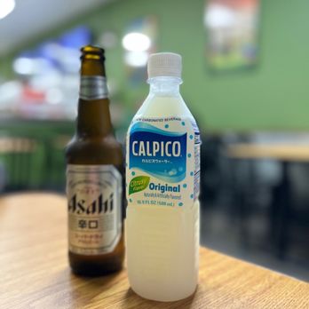 Sushi Raku - a bottle and a bottle of calpico - Japanese Near Me - Tamarac, Florida Sushi Raku - a bottle and a bottle of calpico - Japanese Near Me - Tamarac, Florida