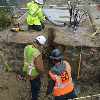 GENTEC Services - Digging a trench for the new 12Kv primary conduit, when complete we will pour slurry concrete over all the conduits. - Electricians Near Me - Tracy, California