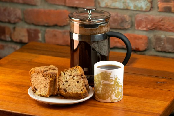 Photo of Two Kick - Seattle, WA, US. a plate of bread and a cup of coffee