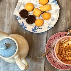 Marialuisa - Tea, white hot chocolate with nuts, and some homemade butter cookies that are served with the drinks.
