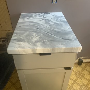 Rock Candy Epoxy Products - a marble top on a cabinet - Flooring Near Me - Rockford, Michigan