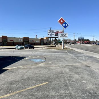 Domino's Pizza - a parking lot with a domino's pizza sign - Pizza Near Me - Idaho Falls, Idaho Domino's Pizza - a parking lot with a domino's pizza sign - Pizza Near Me - Idaho Falls, Idaho