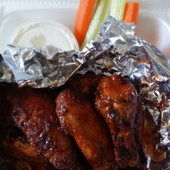 Buffalo's Pizza - Buffalo wings: what they look like when just opening the box.   Personally like them better than wing stops hot. - Pizza Near Me - West Sacramento, California