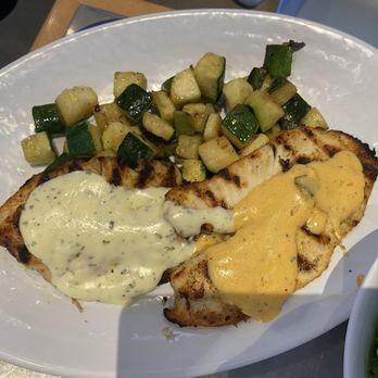 California Fish Grill - Grilled Tilapia with Garlic Butter and Cajun Style Sauces and Diced Rosemary Zucchini - Seafood Near Me - El Cerrito, California California Fish Grill - Grilled Tilapia with Garlic Butter and Cajun Style Sauces and Diced Rosemary Zucchini - Seafood Near Me - El Cerrito, California