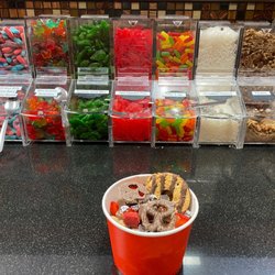 Cool Spoons - One counter with toppings, out of several! 178 toppings on the walls and counters.