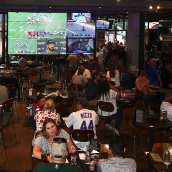 Tom's Watch Bar - There were TVs throughout the bar so no matter where we sat, each of us had clear views of the game. - Sports Bars Near Me - Denver, Colorado Tom's Watch Bar - There were TVs throughout the bar so no matter where we sat, each of us had clear views of the game. - Sports Bars Near Me - Denver, Colorado