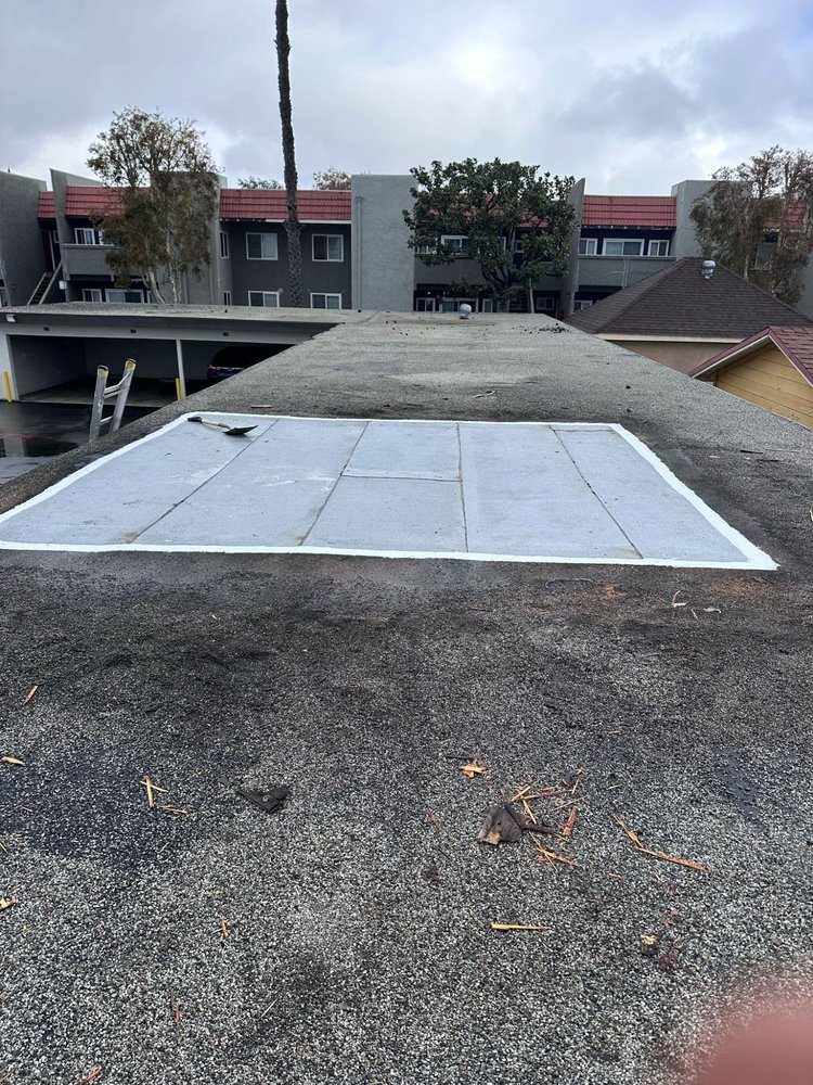 Slide of Tecun’s Roofing