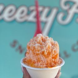 Breezy Freeze Snowball Co. - PEACHES N' CREAM 
This sweet and creamy combo will have you refreshed and cooled down in no time.