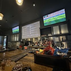 Bar TVs playing sports games and liquor