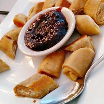 Kitchen at Cobble Hill - Cheese blintzes. Stuffed crepes with farm cheese, served with wild berry jam. - New American Near Me - Brooklyn, New York