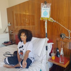 RenewMe IV Therapy & Medspa - Zonnique receiving the Super Immunity Drip