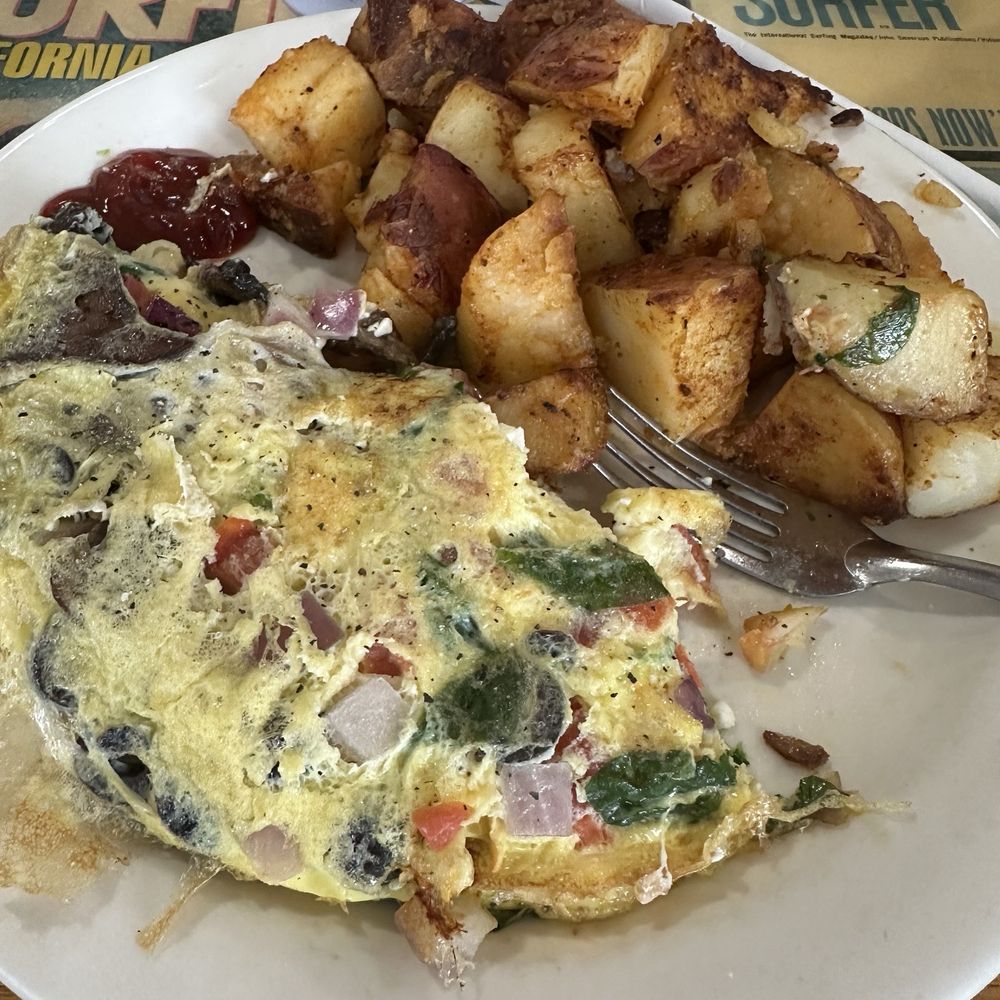 Beach Break Cafe - The Greek omelet was delicious with a lot of fresh veggies. The potatoes had the perfect amount of crispiness. - Breakfast & Brunch Near Me - Oceanside, California Beach Break Cafe - The Greek omelet was delicious with a lot of fresh veggies. The potatoes had the perfect amount of crispiness. - Breakfast & Brunch Near Me - Oceanside, California