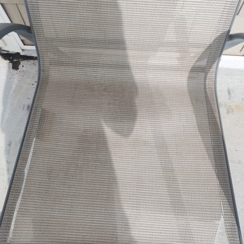 Bryant Real Estate - Torn outside chair - Vacation Rentals Near Me - Carolina Beach, North Carolina