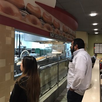 Krispy Kreme - Inside with the donut making in progress - Donuts Near Me - Orange, California Krispy Kreme - Inside with the donut making in progress - Donuts Near Me - Orange, California