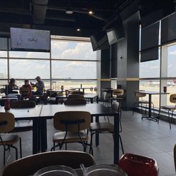 Buffalo Wild Wings - Empty and dirty tables. Still not clean after I sat for an hour and half waiting for my service and food.