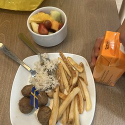 Ikea - Meatballs, rice. french fries, fruit cup, carrot-orange-persimmon juice.