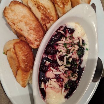 Four Roses Cafe - Baked brie with blackberries and almonds - New American Near Me - Plainwell, Michigan