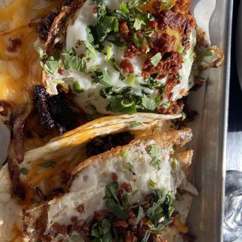 Dirty Taco and Tequila - Rockville Centre - Sunny side egg with spicy chirozo - the egg was so crispy and runny just the way I liked it. Definitely a must try - Tacos Near Me - Rockville Centre, New York