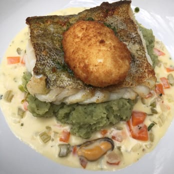 The Woollen Mills - Ling fish with crispy egg on top and clam sauce - Irish Near Me - Dublin, D The Woollen Mills - Ling fish with crispy egg on top and clam sauce - Irish Near Me - Dublin, D