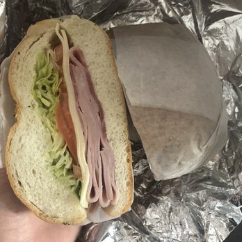 West 82nd Grocery - a hand holding a sandwich - Grocery Near Me - New York, New York West 82nd Grocery - a hand holding a sandwich - Grocery Near Me - New York, New York