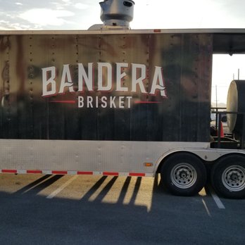 Bandera Brisket - a large trailer with the bandera logo on it - Food Trucks Near Me Bandera Brisket - a large trailer with the bandera logo on it - Food Trucks Near Me