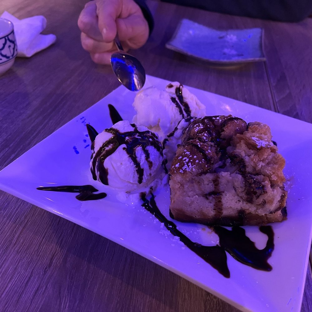 Bangkok West - Homemade apricot bread pudding with coconut ice cream for dessert - Thai Near Me - Aptos, California Bangkok West - Homemade apricot bread pudding with coconut ice cream for dessert - Thai Near Me - Aptos, California