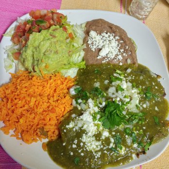 El Azteca Mexican - Chile Verde. Traditionally it's a pork based dish, but it's with Chicken at this restaurant. Top photo is empanadas which are wonderful - Mexican Near Me - Poughkeepsie, New York El Azteca Mexican - Chile Verde. Traditionally it's a pork based dish, but it's with Chicken at this restaurant. Top photo is empanadas which are wonderful - Mexican Near Me - Poughkeepsie, New York