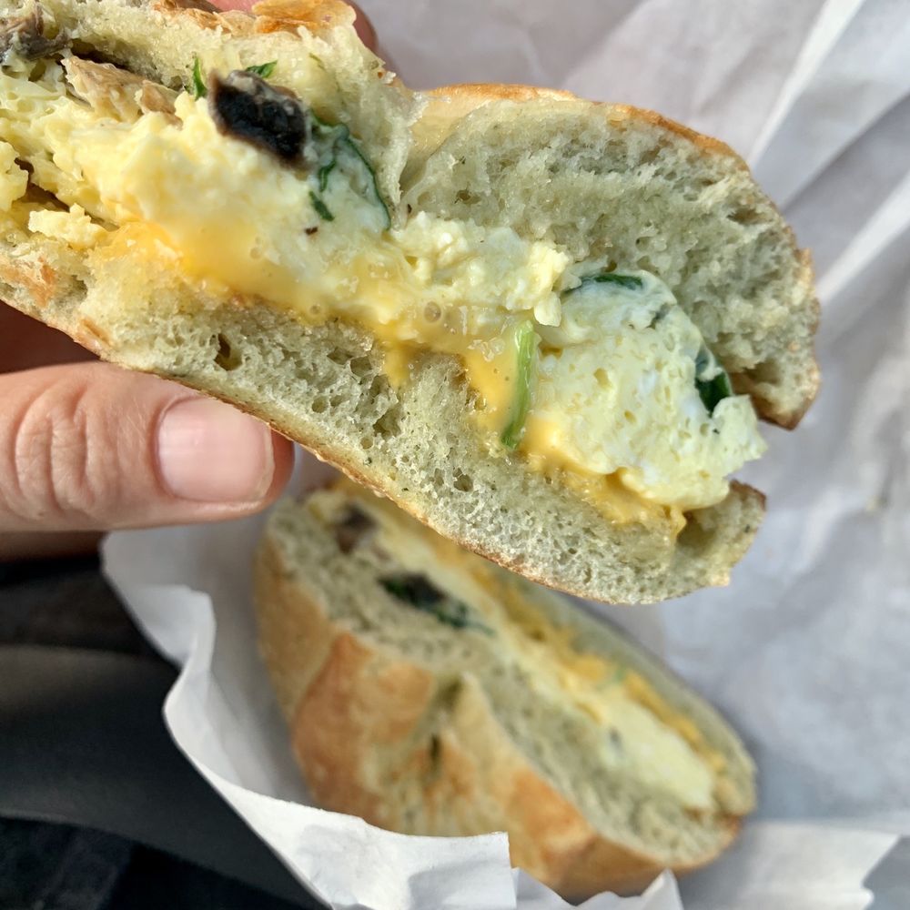 Bagel Junction - Vegetarian bagel with egg and cheese (w/mushroom and spinach) on a spinach bagel! - Coffee & Tea Near Me - Auburn, California Bagel Junction - Vegetarian bagel with egg and cheese (w/mushroom and spinach) on a spinach bagel! - Coffee & Tea Near Me - Auburn, California