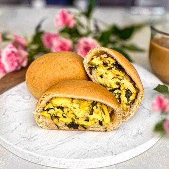 Kolache Factory - a breakfast sandwich on a plate - Bakeries Near Me - Omaha, Nebraska Kolache Factory - a breakfast sandwich on a plate - Bakeries Near Me - Omaha, Nebraska
