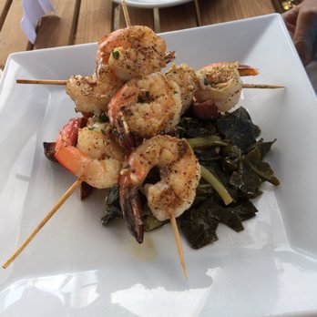 Sunset Pointe - Grilled shrimp served over turnip greens - Bars Near Me - Fairhope, Alabama
