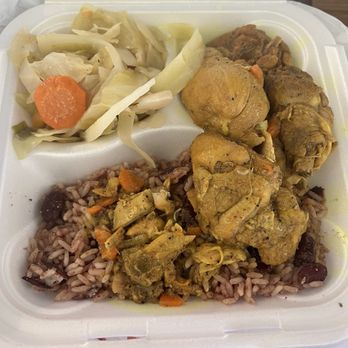 EllIment Restaurant and Lounge - Curry chicken with the rice and peas and cabbage - Lounges Near Me - Louisville, Kentucky EllIment Restaurant and Lounge - Curry chicken with the rice and peas and cabbage - Lounges Near Me - Louisville, Kentucky