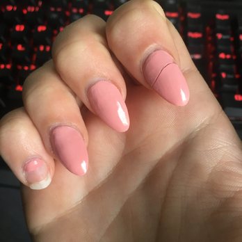 Omega Nails & Spa - not even a week after. I had to superglue the pointer finger back on and my pinkie came off the same day. - Nail Salons Near Me - Cooper City, Florida
