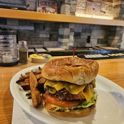 The Rex - The jumbo 9 oz T-Rex bacon Jam cheeseburger with hand cut fries