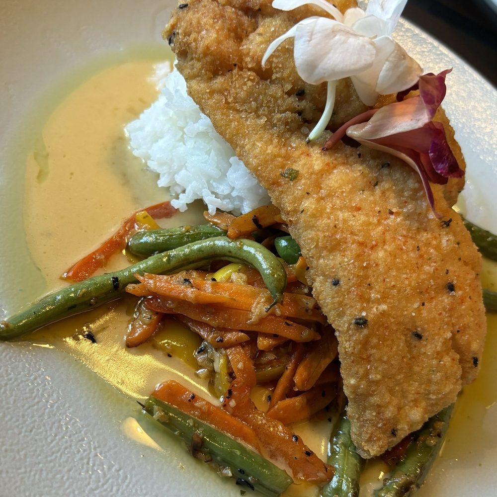 Circa69 - Panko crusted snapper with Jazmine rice and seasonal veggies. - Cocktail Bars Near Me - Jensen Beach, Florida Circa69 - Panko crusted snapper with Jazmine rice and seasonal veggies. - Cocktail Bars Near Me - Jensen Beach, Florida