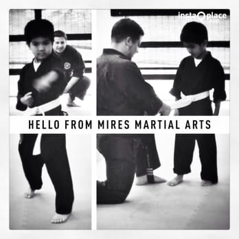 Mires Martial Arts - Richie getting his first stripe on his yellow belt - Martial Arts Near Me - Concord, California Mires Martial Arts - Richie getting his first stripe on his yellow belt - Martial Arts Near Me - Concord, California
