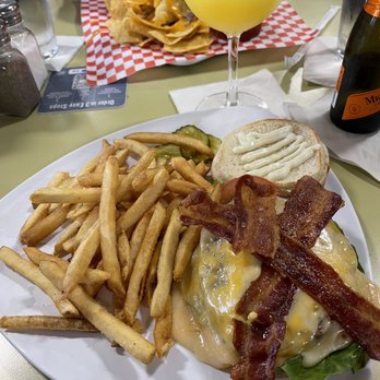 Stinger Ray's Tropical Bar & Grill - Cheeseburger, REGULAR mimosa, and kalua nachos - Bars Near Me - Honolulu, Hawaii Stinger Ray's Tropical Bar & Grill - Cheeseburger, REGULAR mimosa, and kalua nachos - Bars Near Me - Honolulu, Hawaii