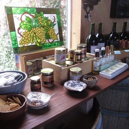 free cheeses, crackers, oil dips, bread, jam