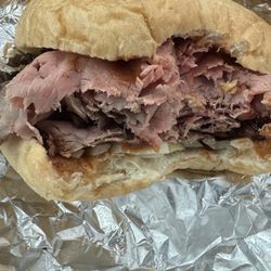Baker's Pit Beef - Pit beef with white onions and bbq sauce