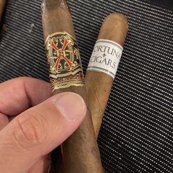 Metropolitan Cigar Society - Enjoying two of my favorite cigars and my favorite members only cigar lounge.