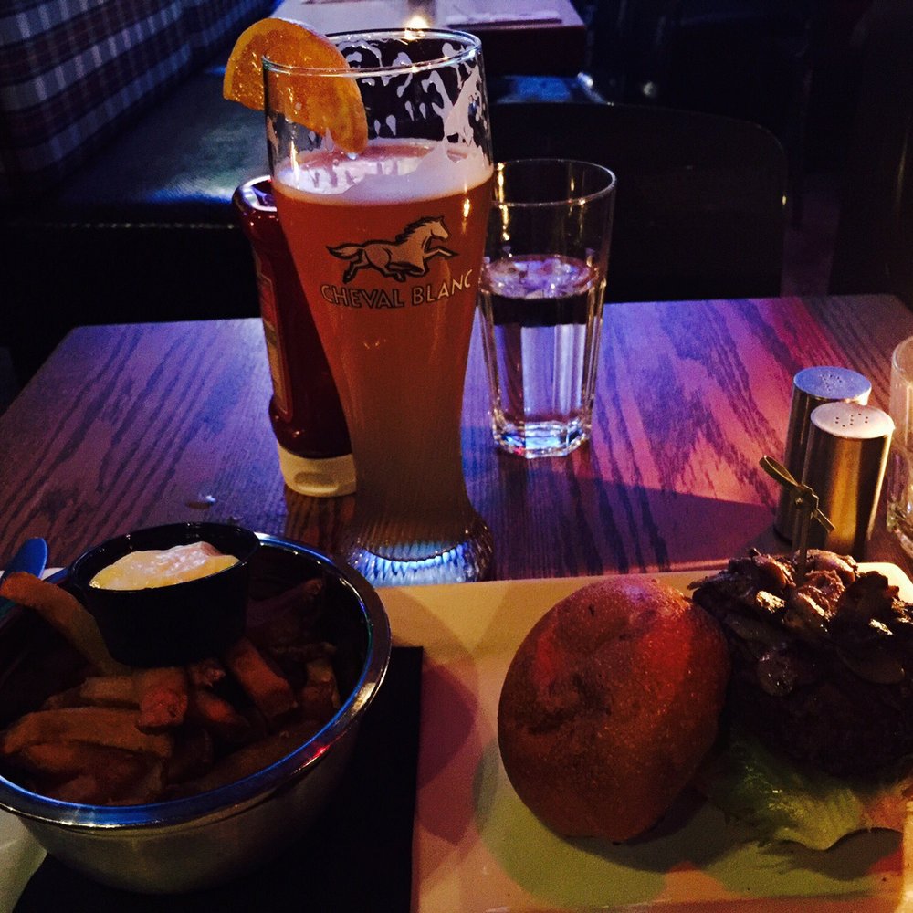 Saloon Bistro Bar - Saloon burger with fries ($16.50) and Cheval Blanc white beer. - Bars Near Me - Montreal, Quebec