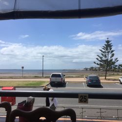 Coopers Fish & Chips and Cafe - Beautiful view of the beach from the outdoor seating complimenting the cool breeze.