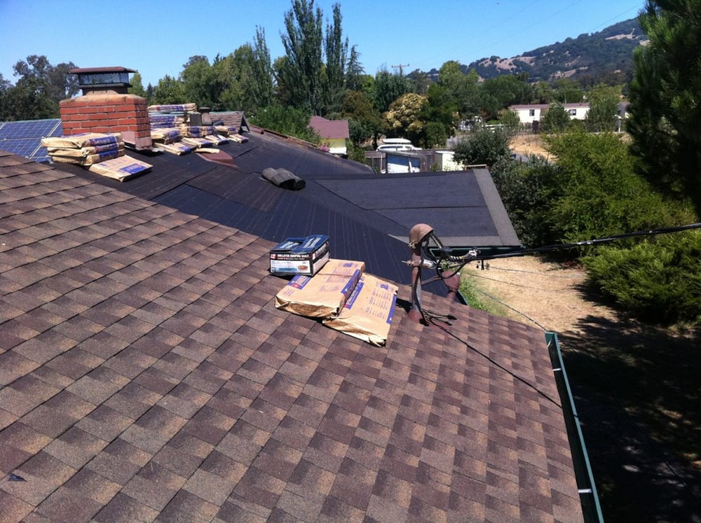 Slide of Adams Roofing