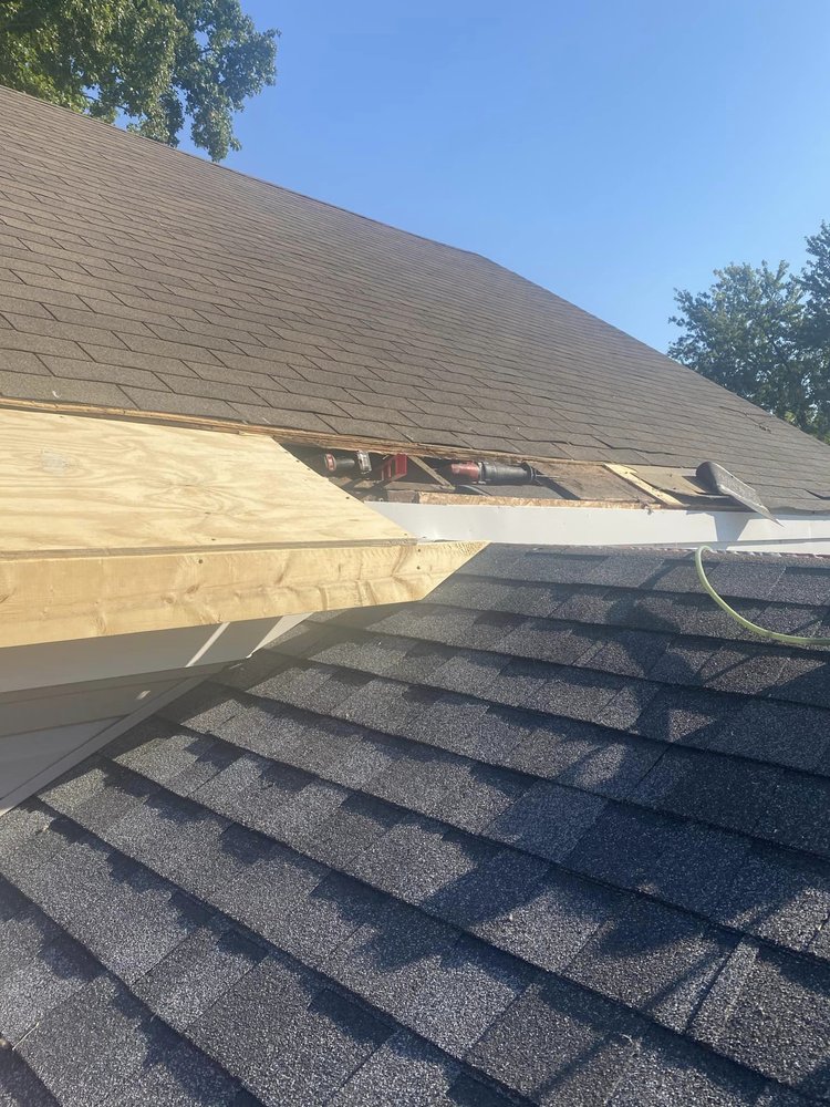 Slide of Archyk Roofing