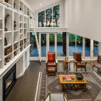 Britt Wibmer - Wall of west-facing windows enhance this peaceful living room in West Bellevue. - Real Estate Agents Near Me - Kirkland, Washington