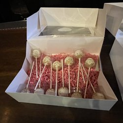 Bug & Buttas Bake Shoppe - Vanilla cake pops with white chocolate icing and gold sugar.